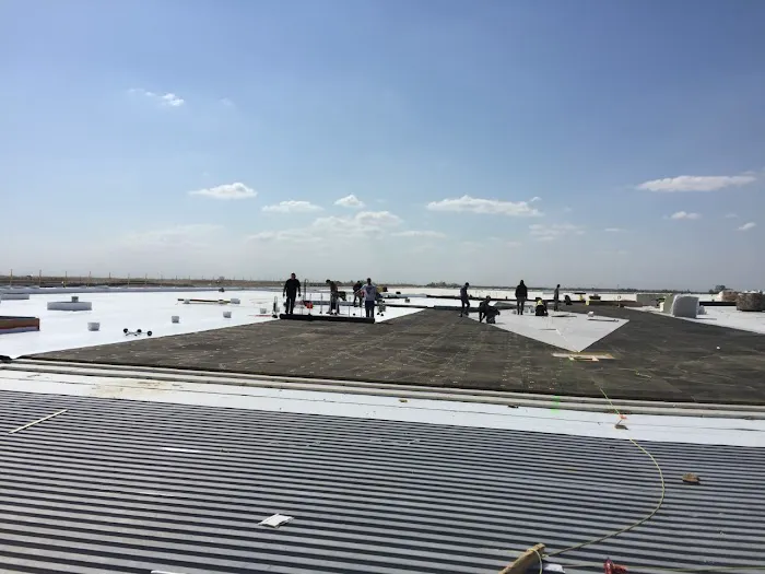 TRS Building Envelope | TOMTAR Roofing & Sheet Metal Picture 1