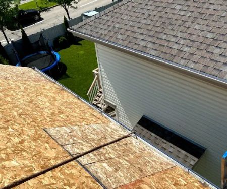 2 The Top Roofing Corp.