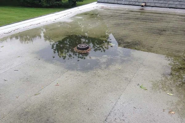 How to Prevent Water Pooling (Ponding) on Flat Commercial Roofs