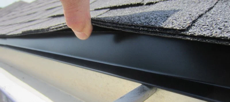 How Roof Flashing Prevents Ice Dam Damage Along Roof Edge | Pickering Roofing