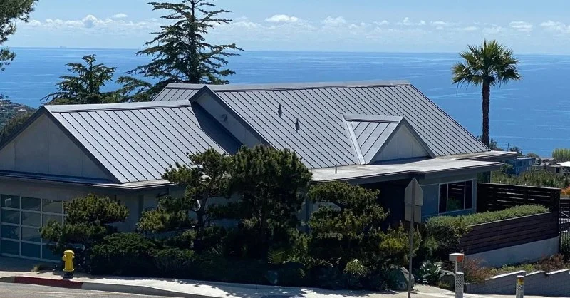 Adapting Roofing Design to Coastal Salt Spray & Wind Conditions