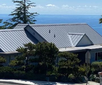 Adapting Roofing Design to Coastal Salt Spray & Wind Conditions