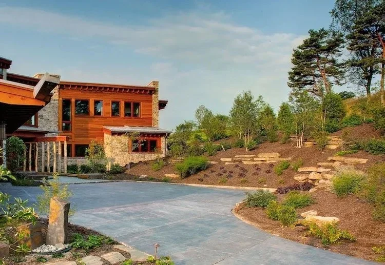 Choosing Roofing Styles for Sloped Landscapes & Hillside Homes