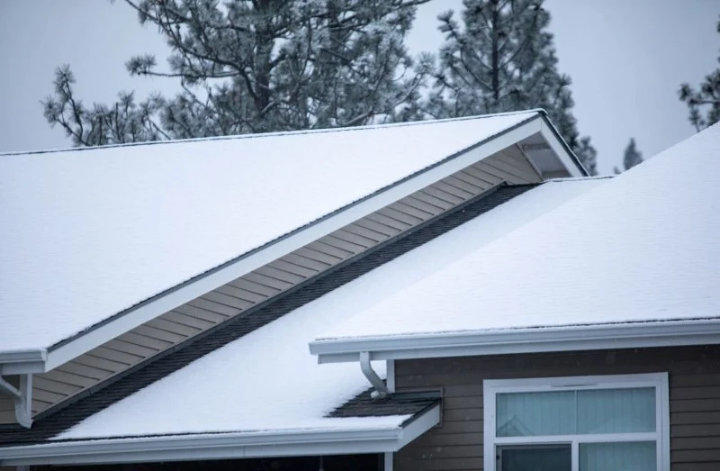 How Roof Designs Can Reduce Roof Snow Weight & Ice Build-up
