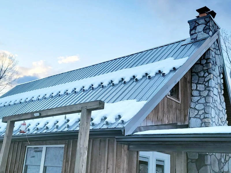 Best Practices to Prevent Ice & Snow Slippage Off Metal Roofs | Tips & Solutions