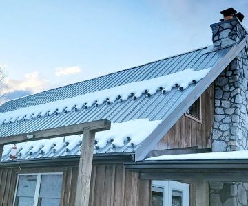 Best Practices to Prevent Ice & Snow Slippage Off Metal Roofs | Tips & Solutions