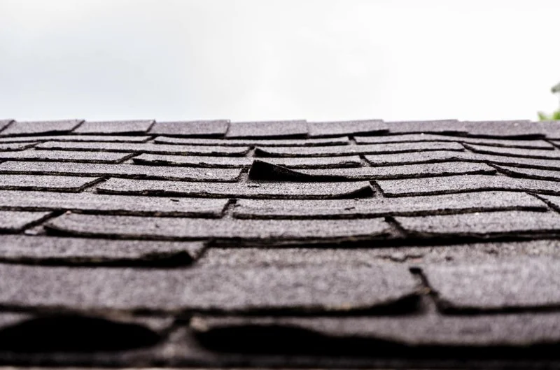 Roof Shingle Curling Causes & Long-Term Fixes
