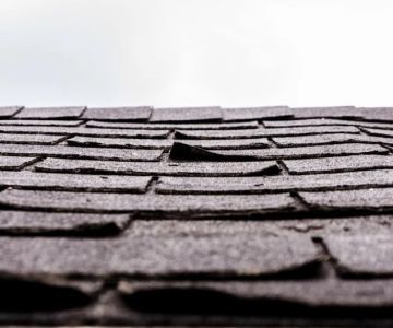 Roof Shingle Curling Causes & Long-Term Fixes