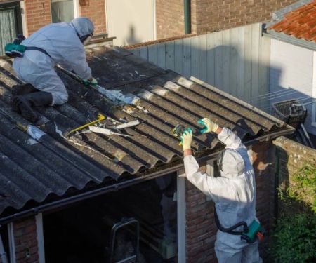 How Roof Contractors Handle Asbestos or Hazardous Materials Safely