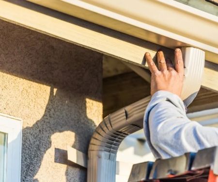 How Gutters & Downspouts Affect Roof Lifespan