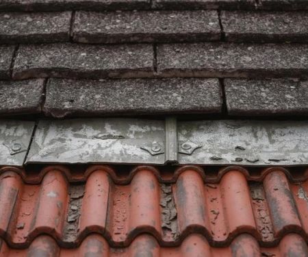 Roof Hail Damage Repair Costs: Asphalt vs Metal vs Tile Comparison