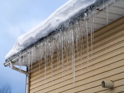 Ice Dam Prevention: Roof Designs and Maintenance Tips