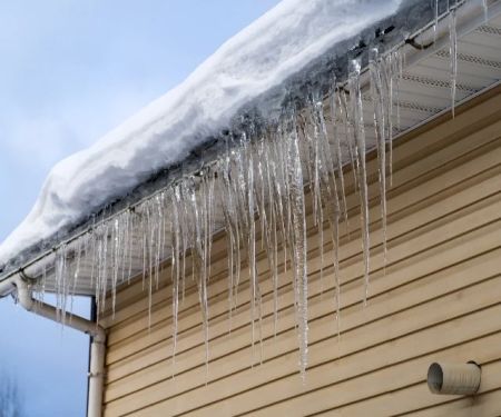 Ice Dam Prevention: Roof Designs and Maintenance Tips