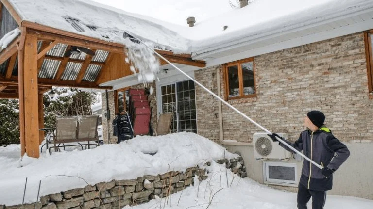 Snow Load on Roofs in Canada: How Much Snow Is Too Much and When to Remove It